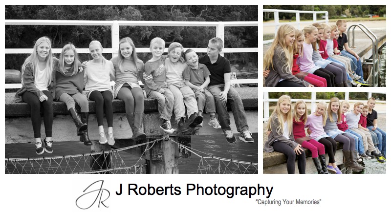 Kids sitting on the pier at clifton gardens - sydney winter family portrait photography